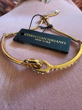 Christian Siriano Gold Tone Knot Slider Bracelet (J0229)